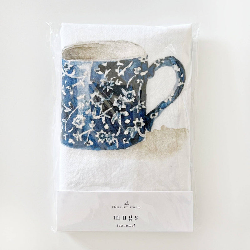 The Mugs tea Towel in its packaging.