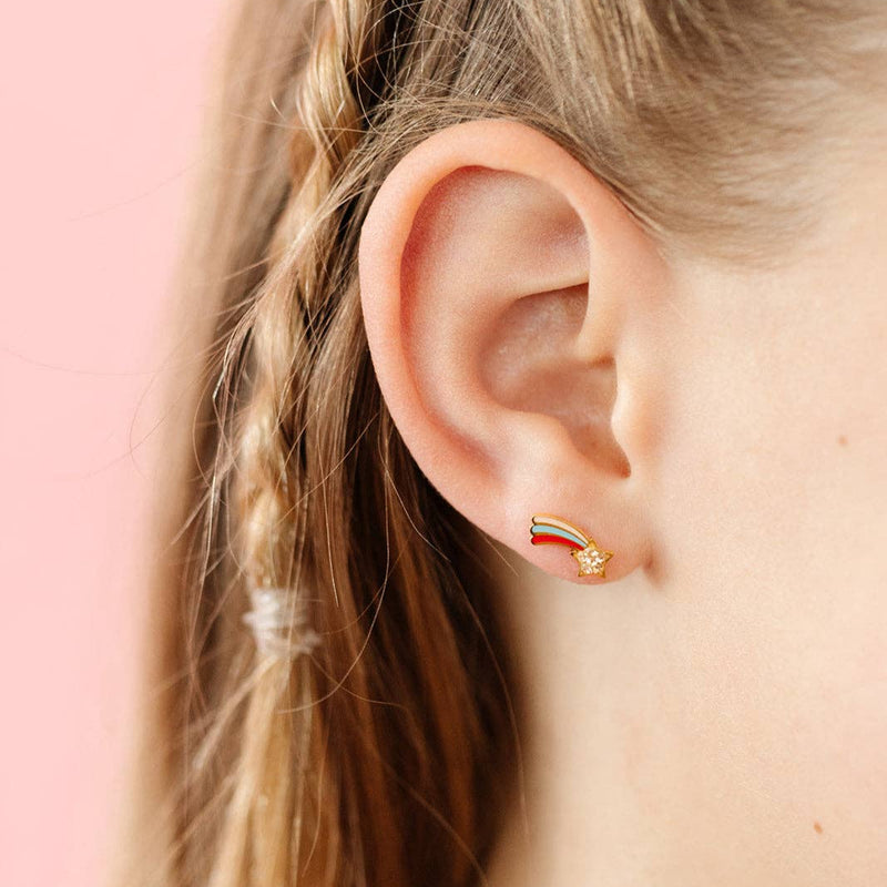 A close-up of a girl wearing the Shooting Star Stud Earrings.