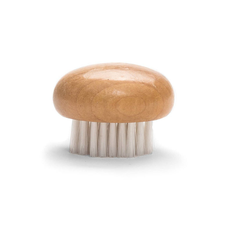 A wooden mushroom-shaped brush with white nylon bristles.