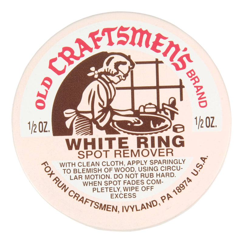 A beige tin of White Ring Spot Remover with brown and red lettering.