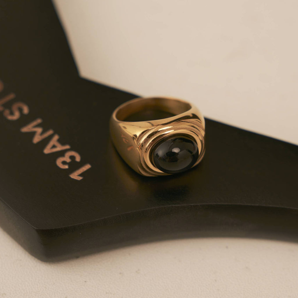 A close-up of the Onyx Square Signet Ring.