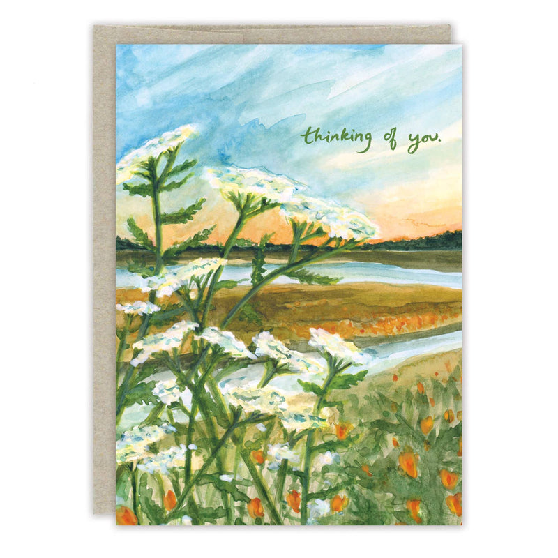 A watercolor gouache illustrated card of yarrow flowers with a river and meadow in the background below the words "thinking of you" in green cursive.