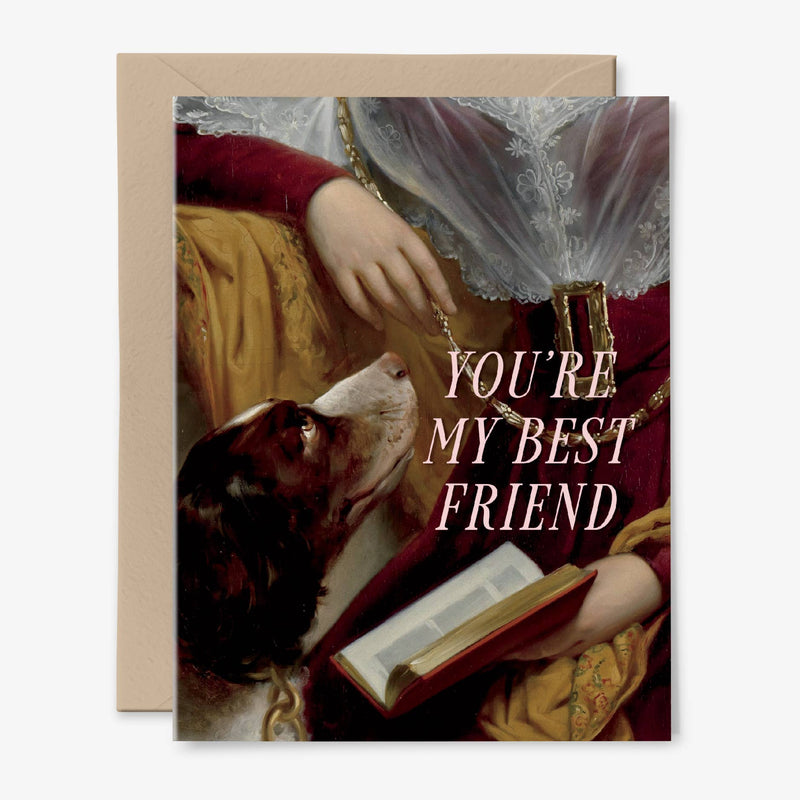 A card illustrated with a dog looking up at a person holding a book and the words "You're My Best Friend" in pink.