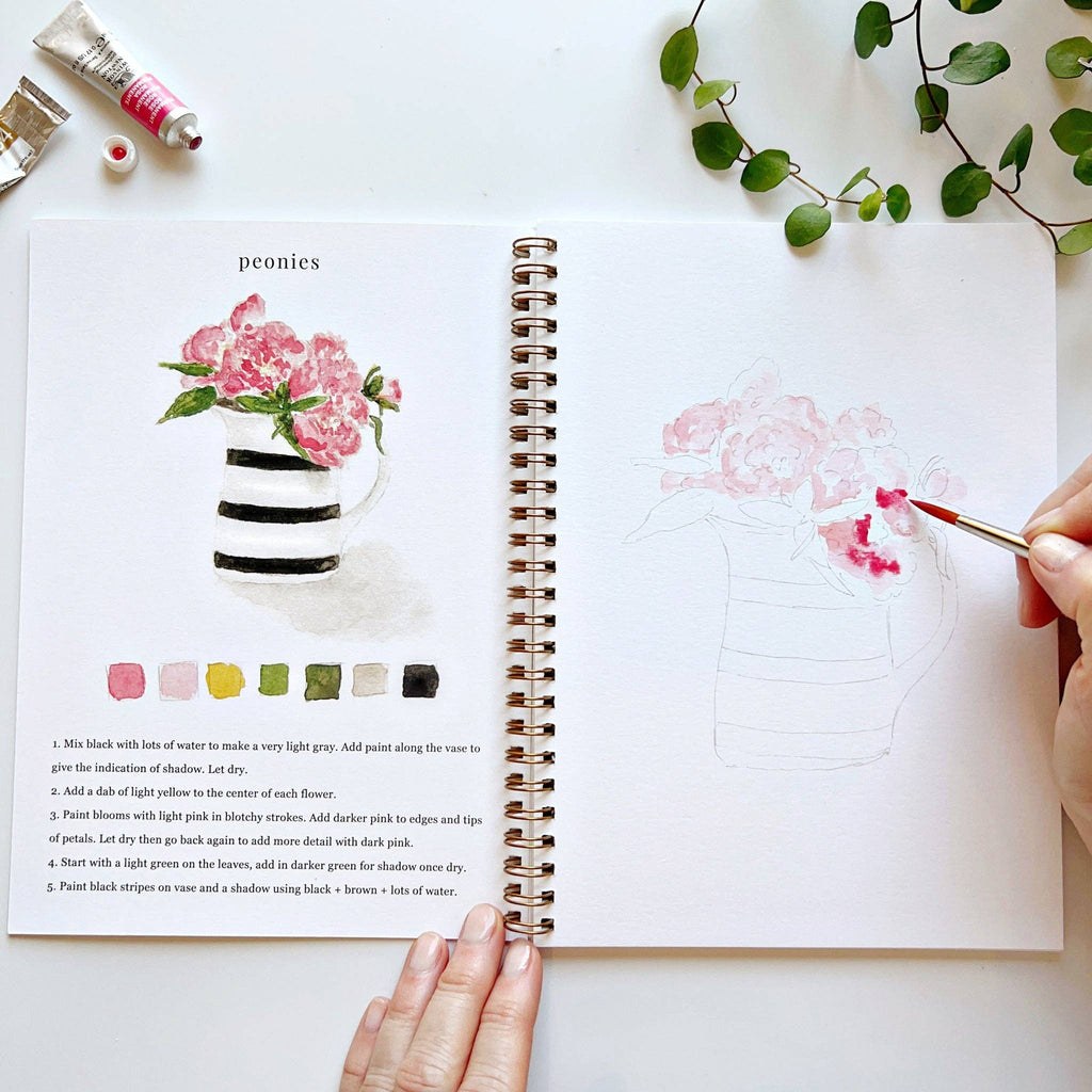 A person watercolor painting pink peonies.