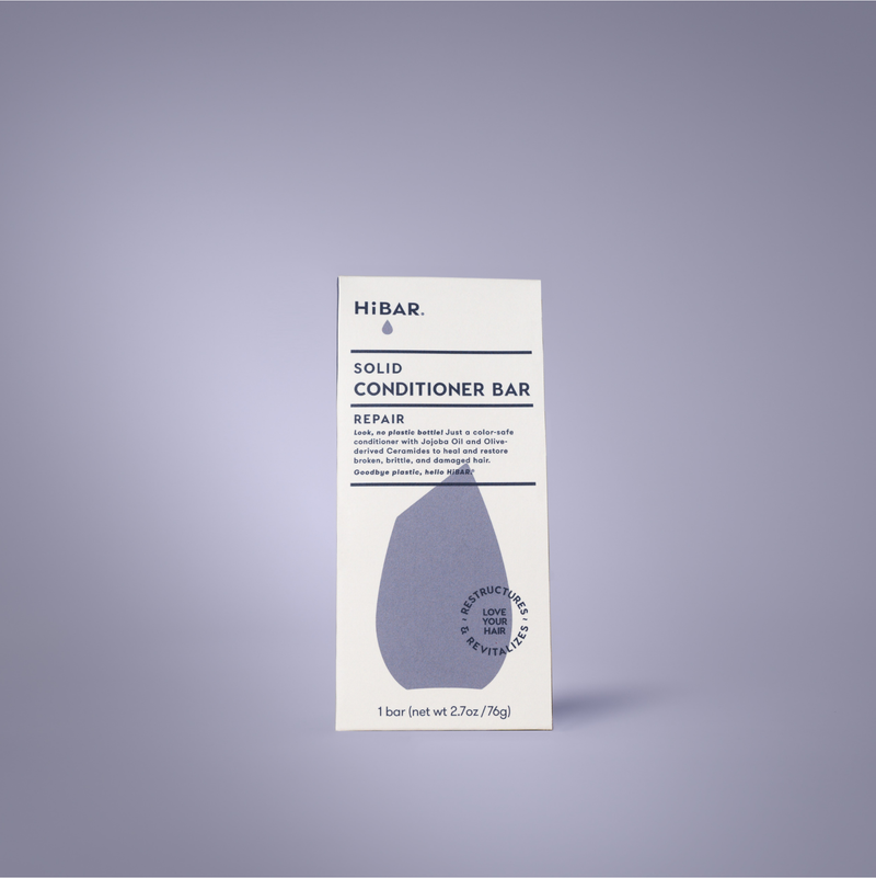 The white and purple HiBar Repair Conditioner packaging.