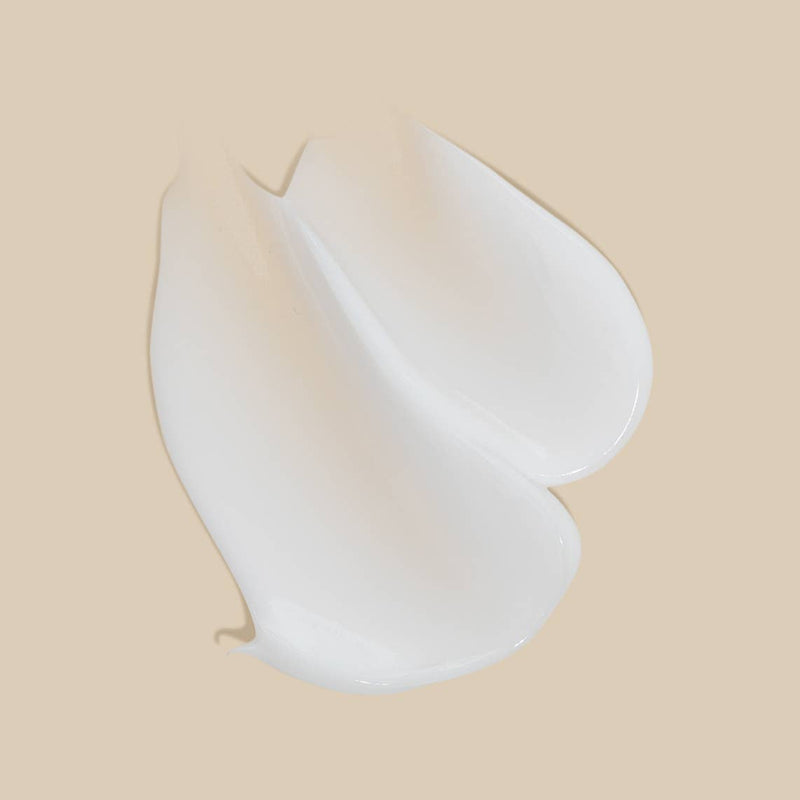 A smear of white Shea Butter Lotion.