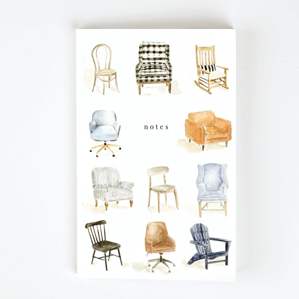 A white notebook illustrated with different watercolor chairs around the word "notes".