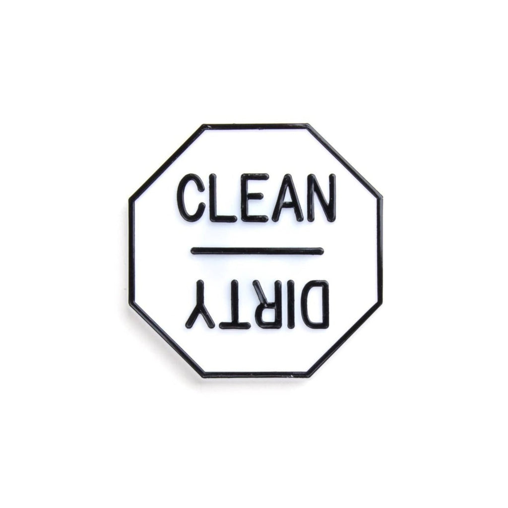 A white and black octagon magnet with Clean on the top and Dirty upside down on the bottom.