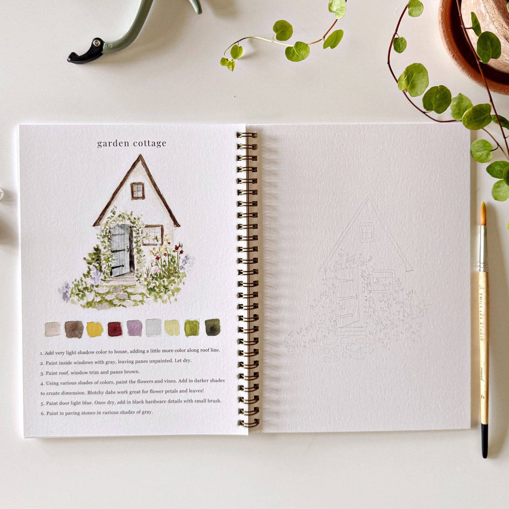 A Garden Watercolor Workbook layout with a garden cottage on the left and a blank outline on the right.