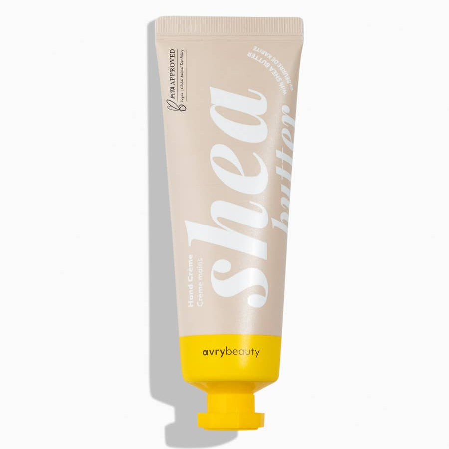 A beige tube of Shea Butter Lotion with a yellow cap.