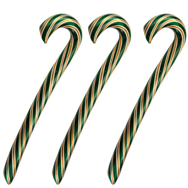 A trio of green, white, and brown striped caramel apple candy canes.