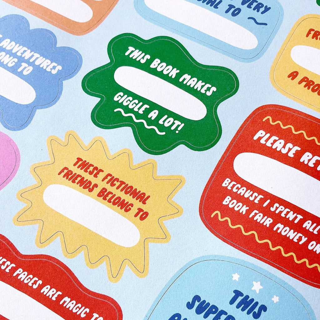 A close-up of the book plates with phrases like "This Book Makes ____ Giggle a Lot!" and "These Fictional Friends Belong To _____."