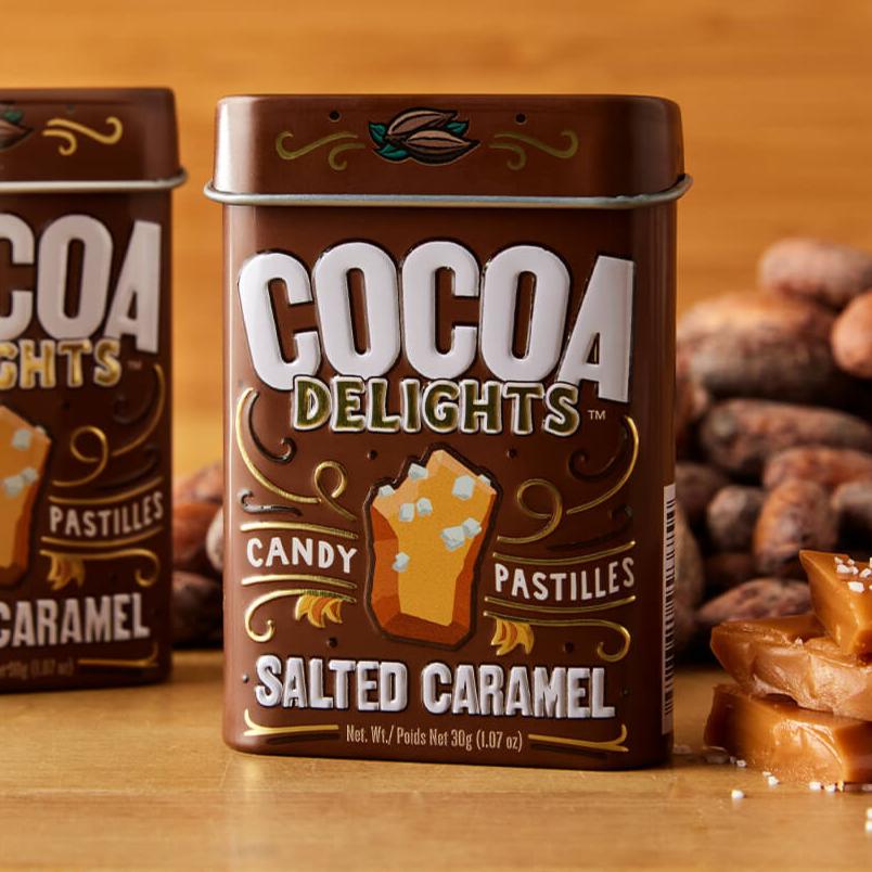 A brown tin of Salted Caramel Cocoa Delights candies.