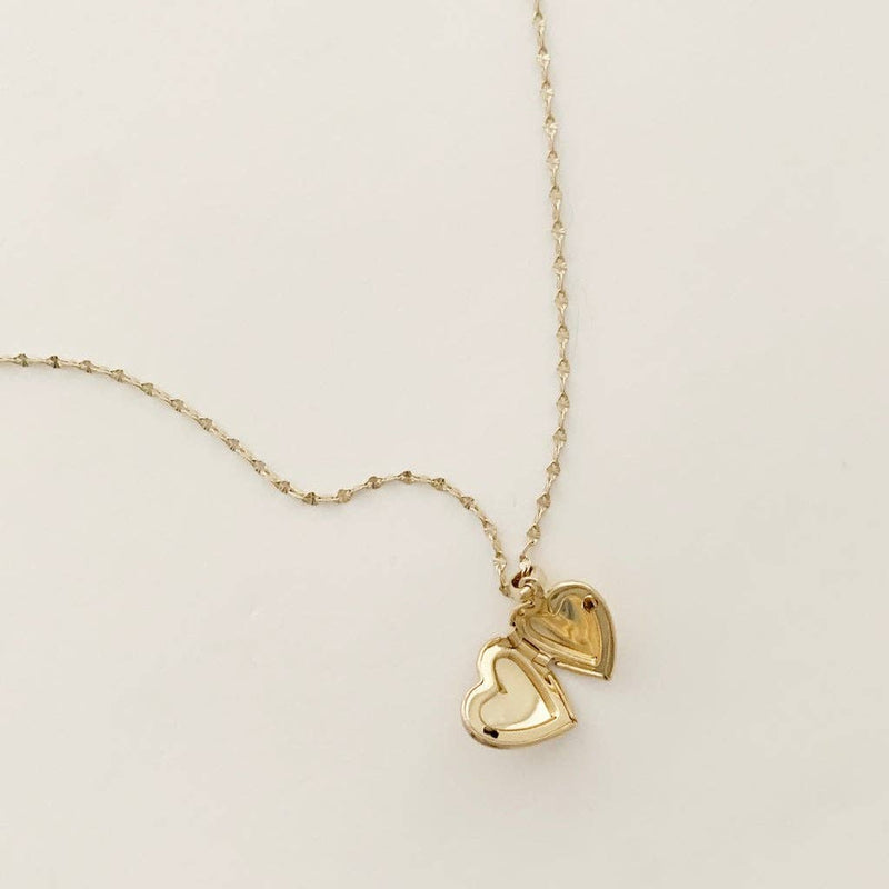 An open Golden Heart Locket.