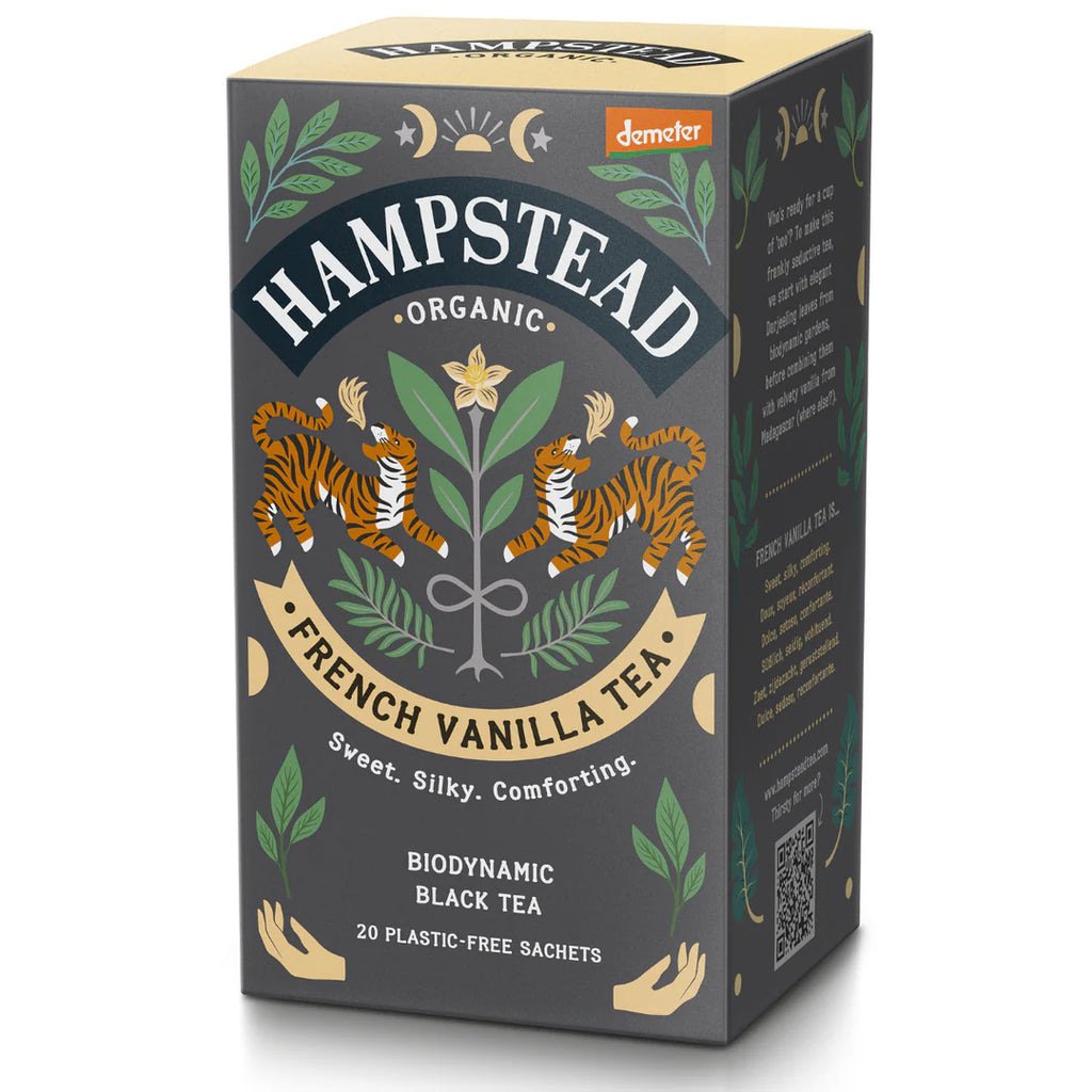 A dark gray and cream box of Hampstead Organic French Vanilla Tea with illustrations of two tigers surrounded by foliage and celestial bodies.