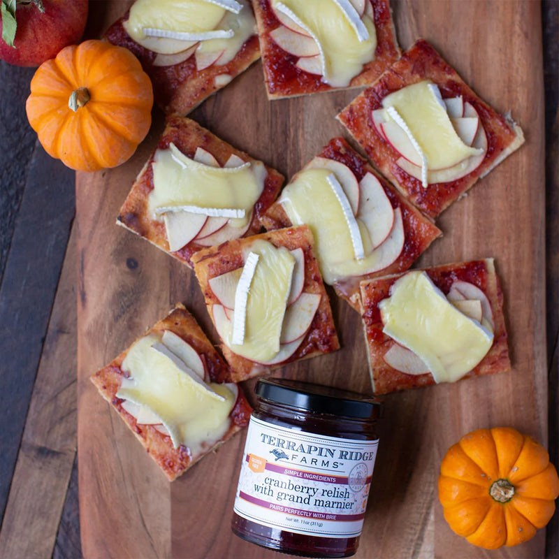 Crackers and cheese slathered with Cranberry Relish with Grand Marnier.