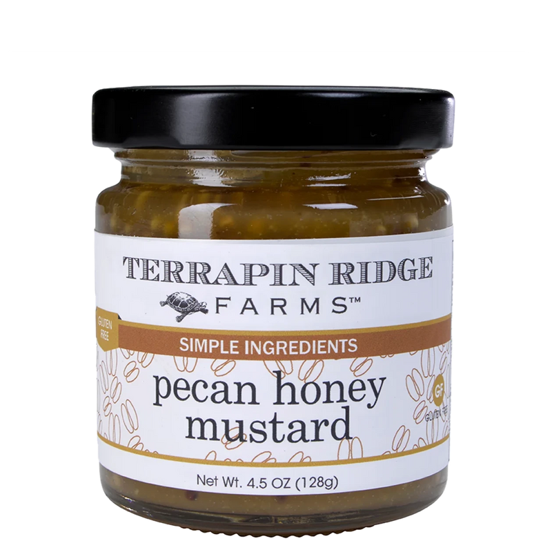 A clear jar of Pecan Honey Mustard with a black lid.