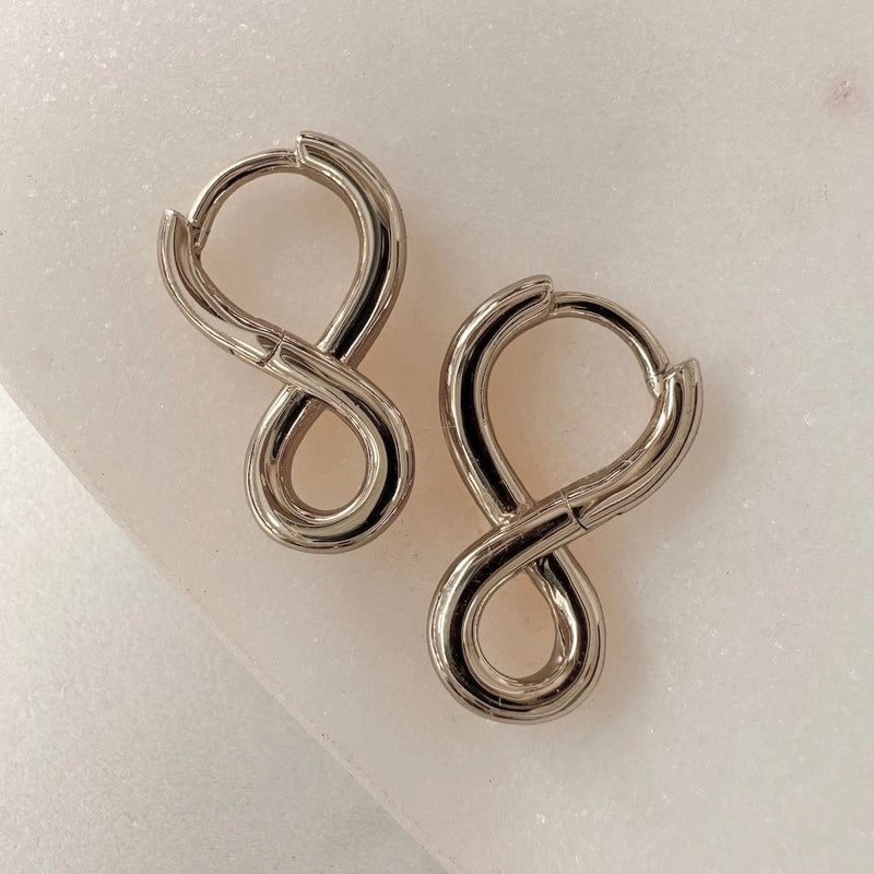 A pair rhodium plated Loopty Loo Earrings.