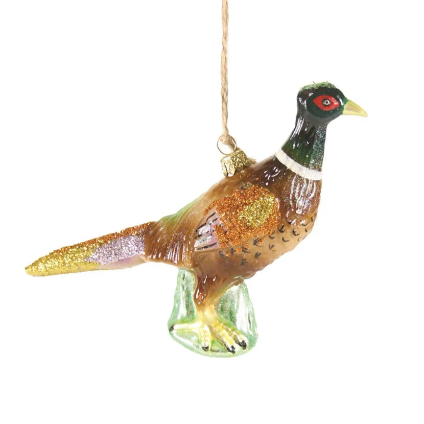 A glass pheasant ornament with glitter details around the head and wings.