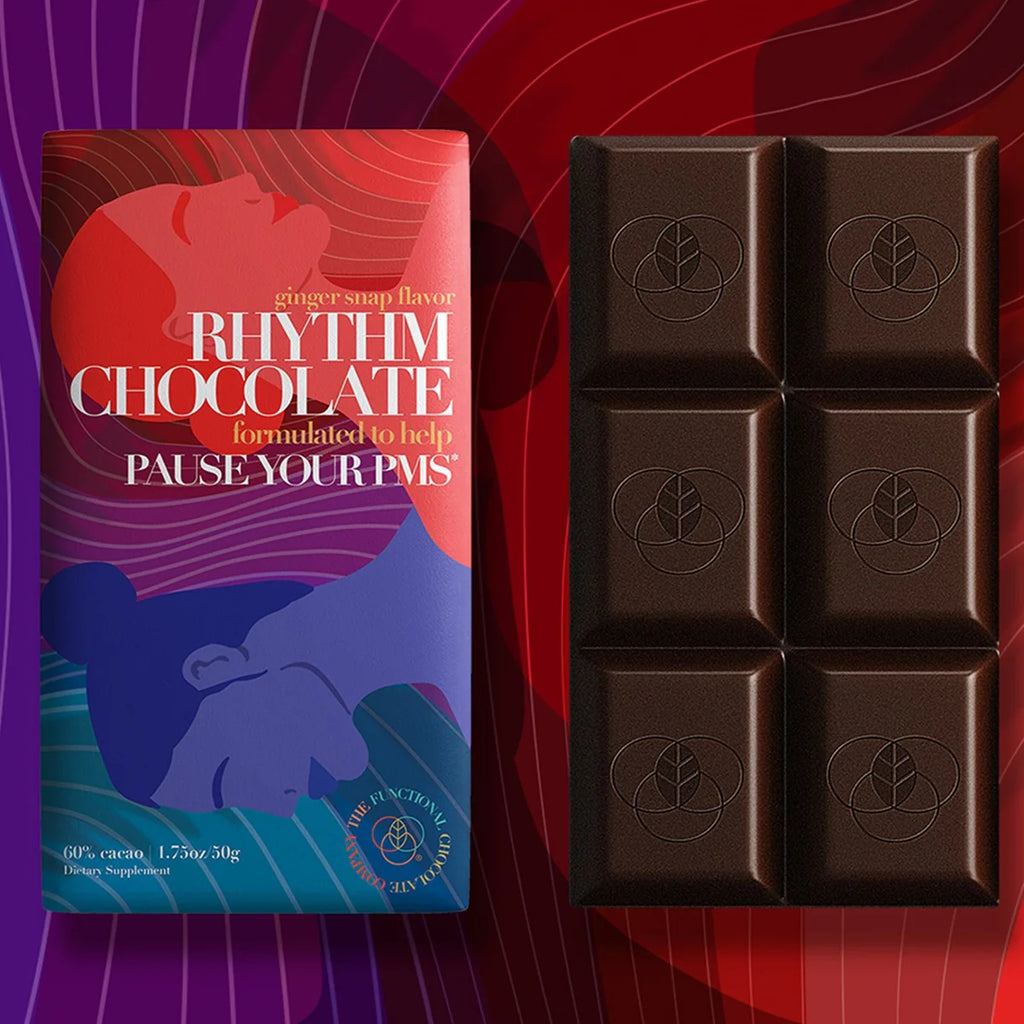 A bar of Rhythm Chocolate next to its packaging.