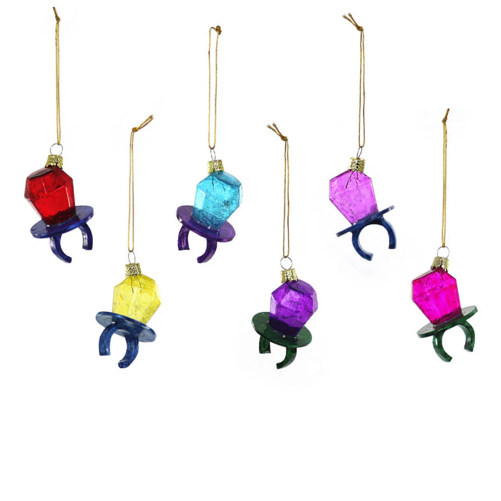 Six glass ornaments shaped like Ring Pop candy hanging by gold loops.