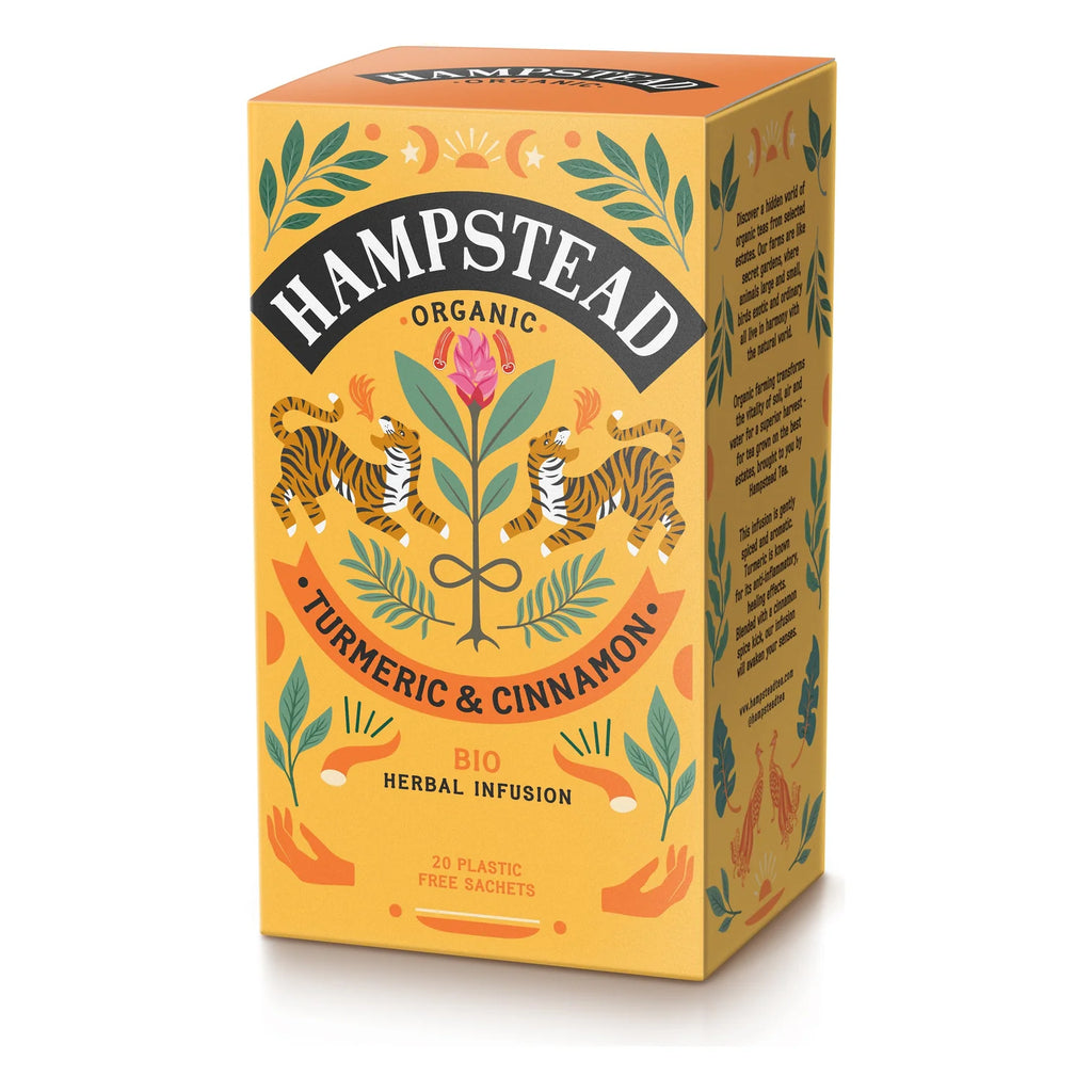 A orange box of Hampstead Organic Turmeric & Cinnamon Tea with illustrations of tigers, foliage, and celestial bodies.