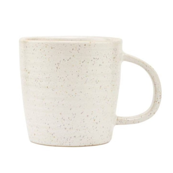 A white mug with gray speckles.