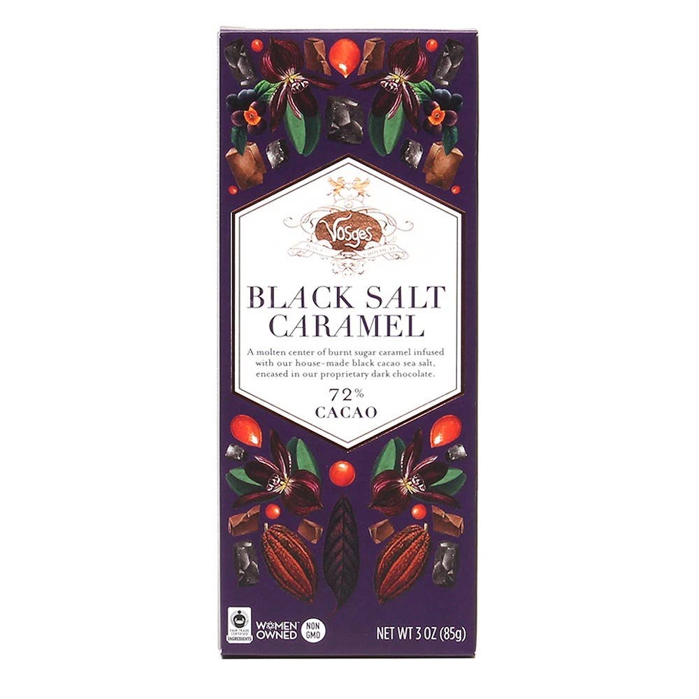 A Black Salt Caramel Chocolate Bar wrapped in deep purple packaging with rose gold foil and botanical illustrations.